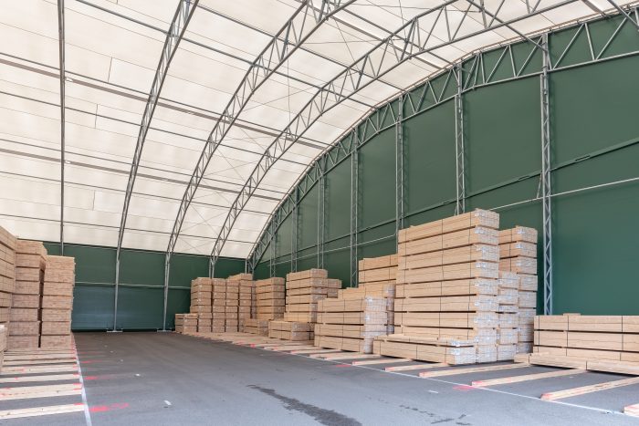 Storage tent filled with timber