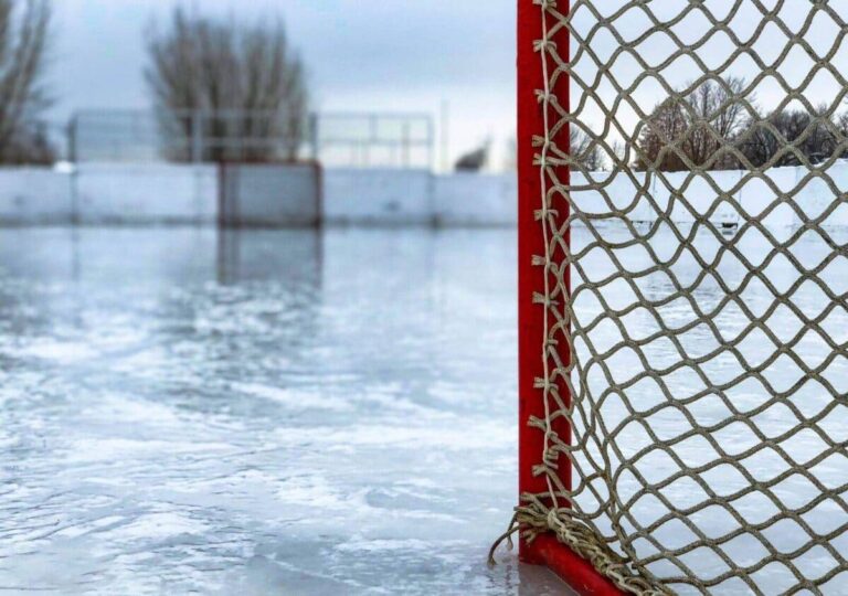 Ice hockey rink with a hockey goal. The picture is for a guide on how to build your own ice hockey rink